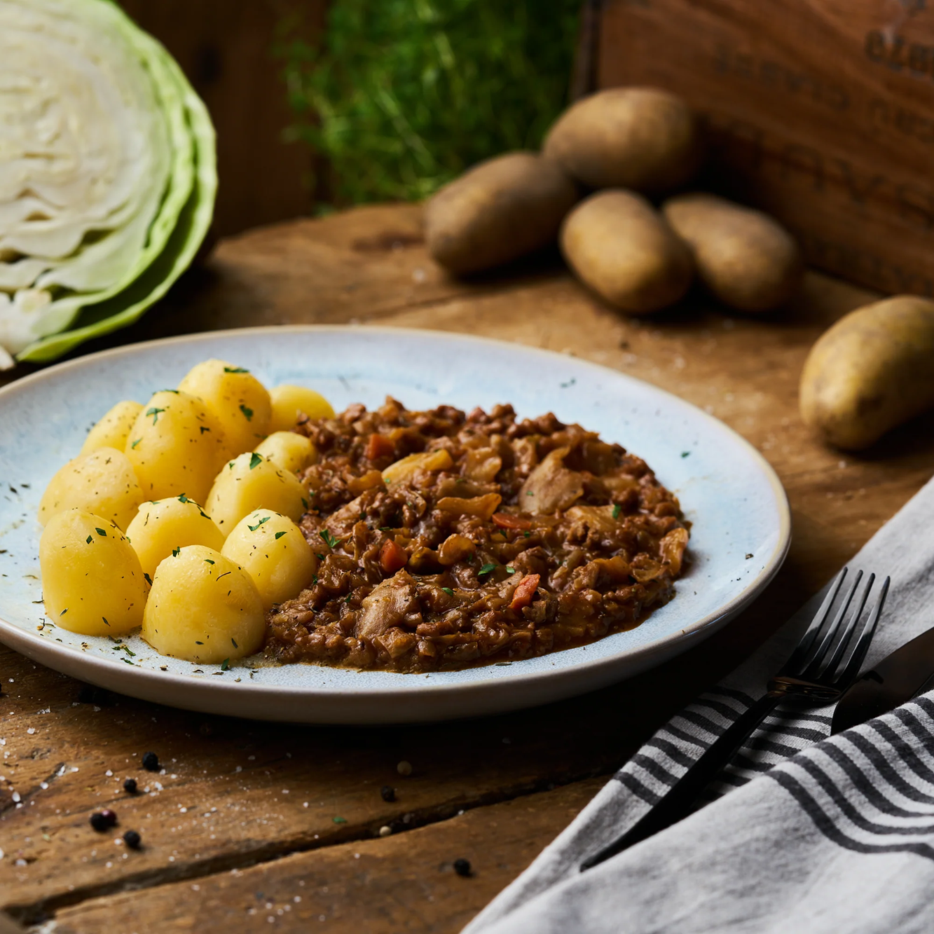 Schmorkohl mit Butterkartoffeln