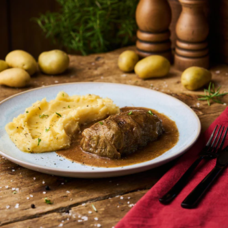 Vegetarische Kohlroulade mit Kartoffelpüree Vegetarische Kohlroulade mit Kartoffelpüree