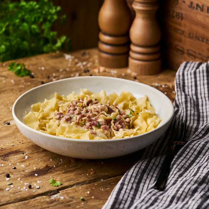 Wellbandnudeln mit Sauce Carbonara